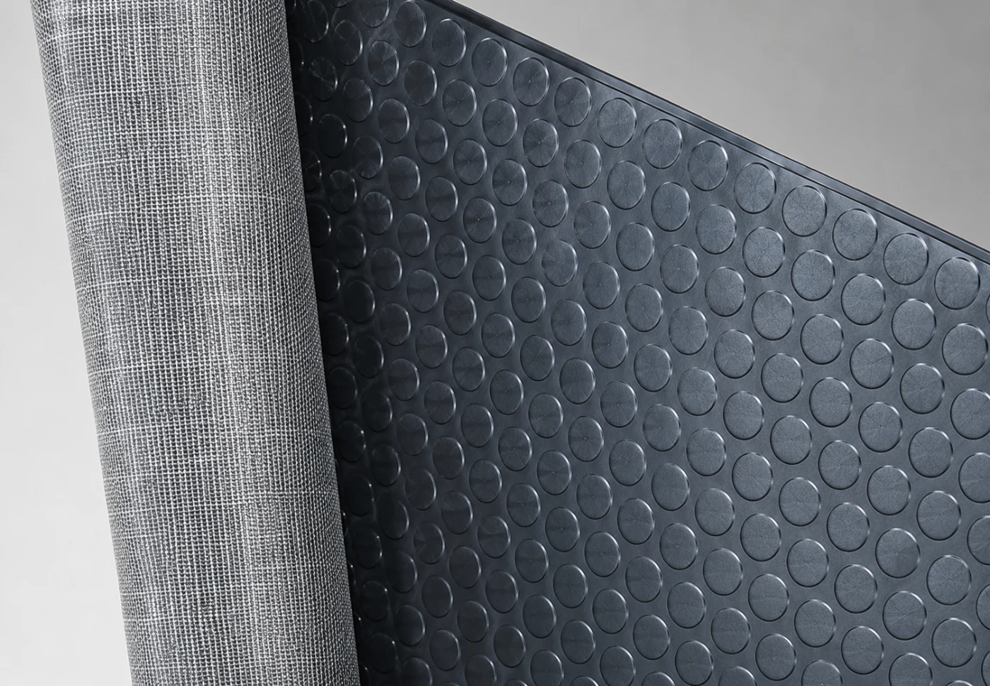 Tapete antiderrapante tachonado con base textil